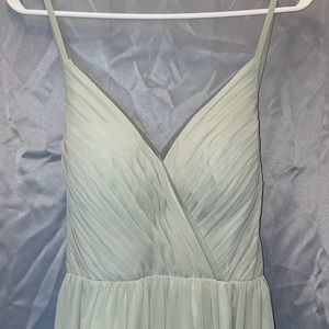 Green prom dress with leg slit
